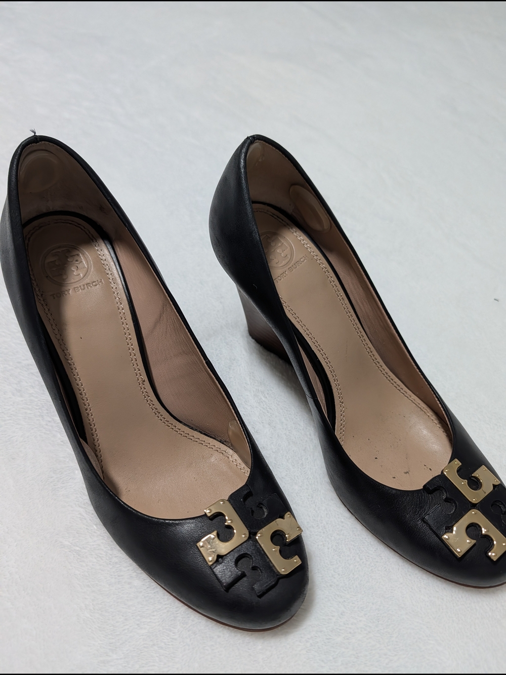 Tory Burch Black Leather Wedge Pumps with Gold Logo